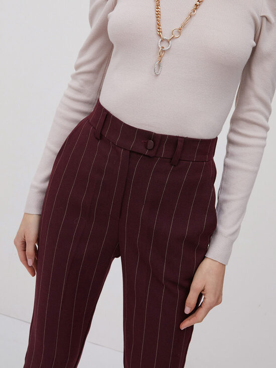 Motivi burgundi női nadrág arany csíkokkal